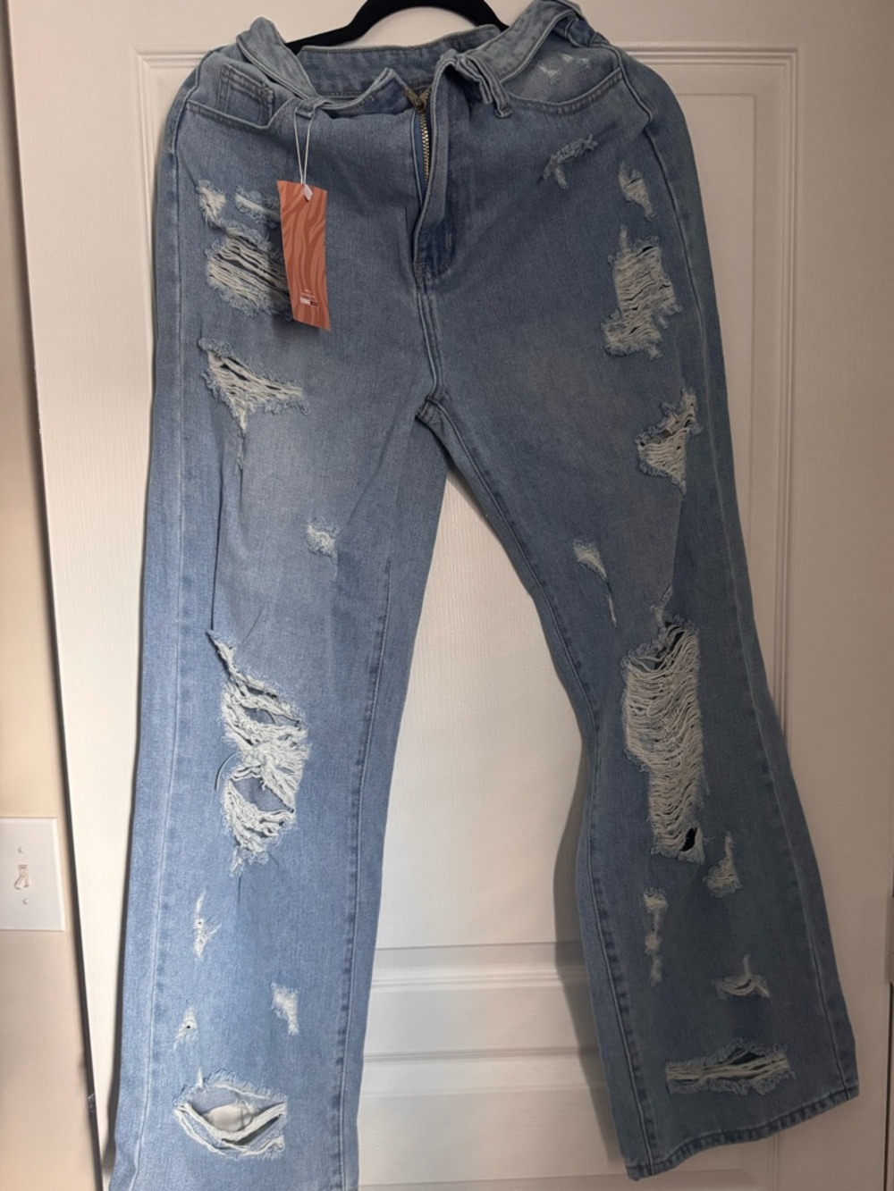 Distressed Light Blue Women’s Jeans - Casual Ripped Style